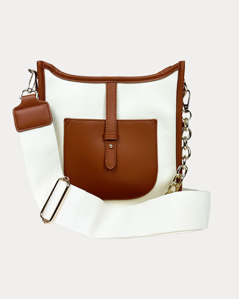 Amelia Canvas Messenger with Camel Vegan Leather details. A chain strap and a 2" adjustable bag strap.