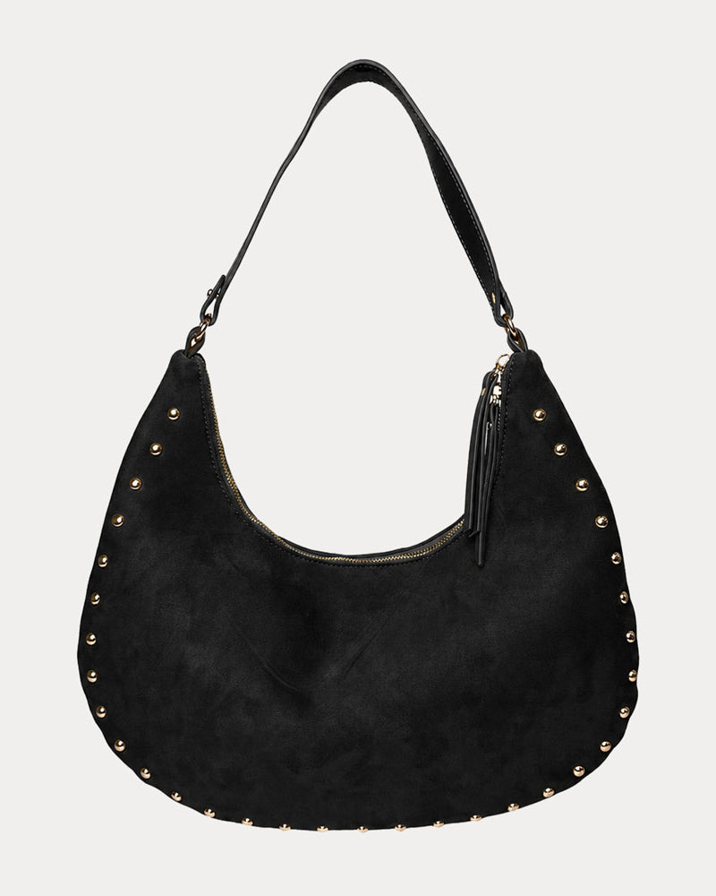 Black vegan suede handbag with studs on a light gray background