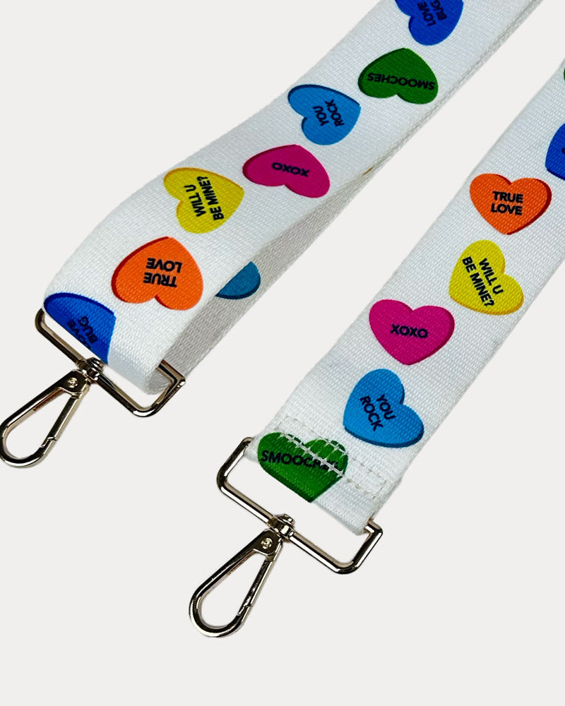 White ground conversation heart print bag strap with gold metal clasps