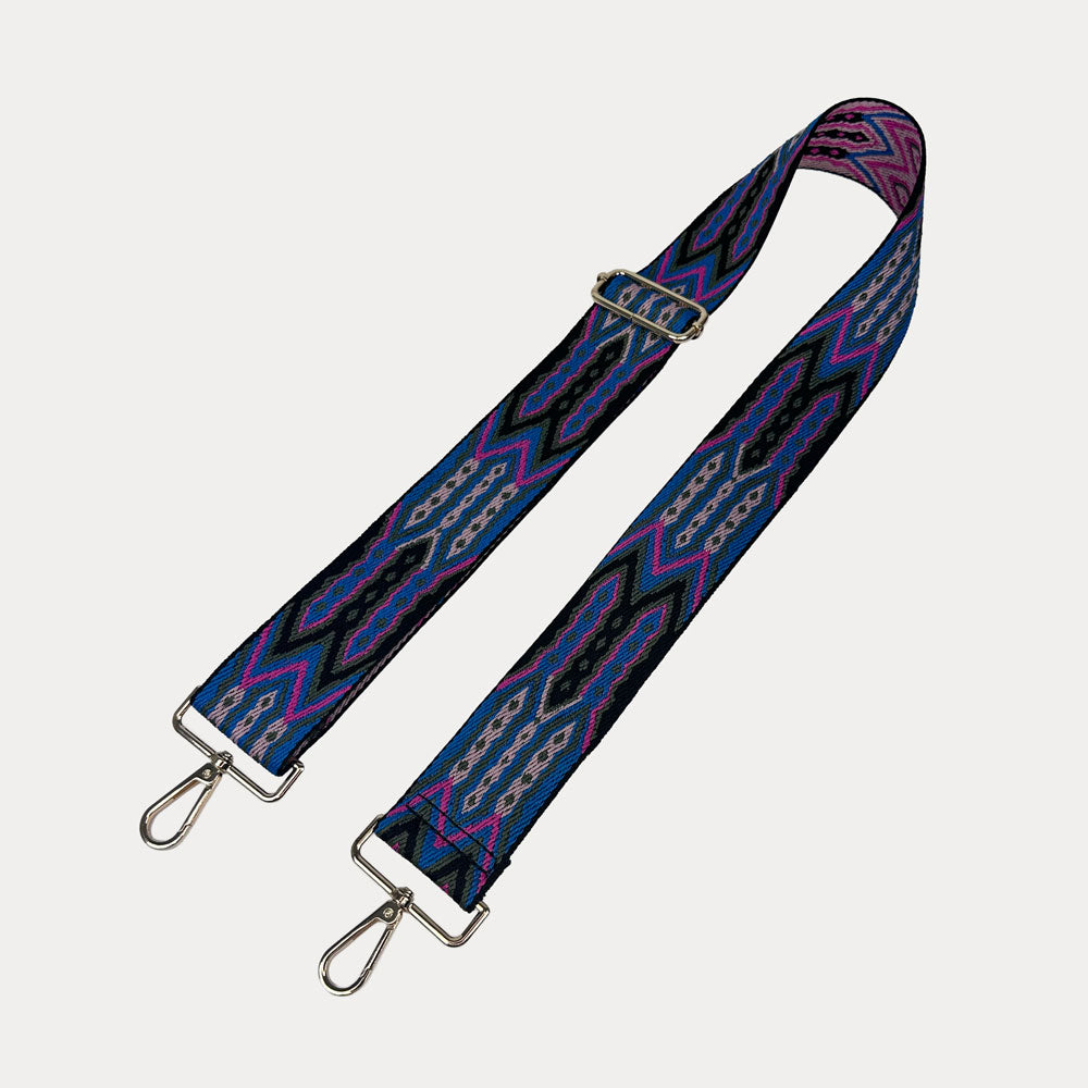 Blue, Pink, Black patterned strap with gold hardware on a light grey background