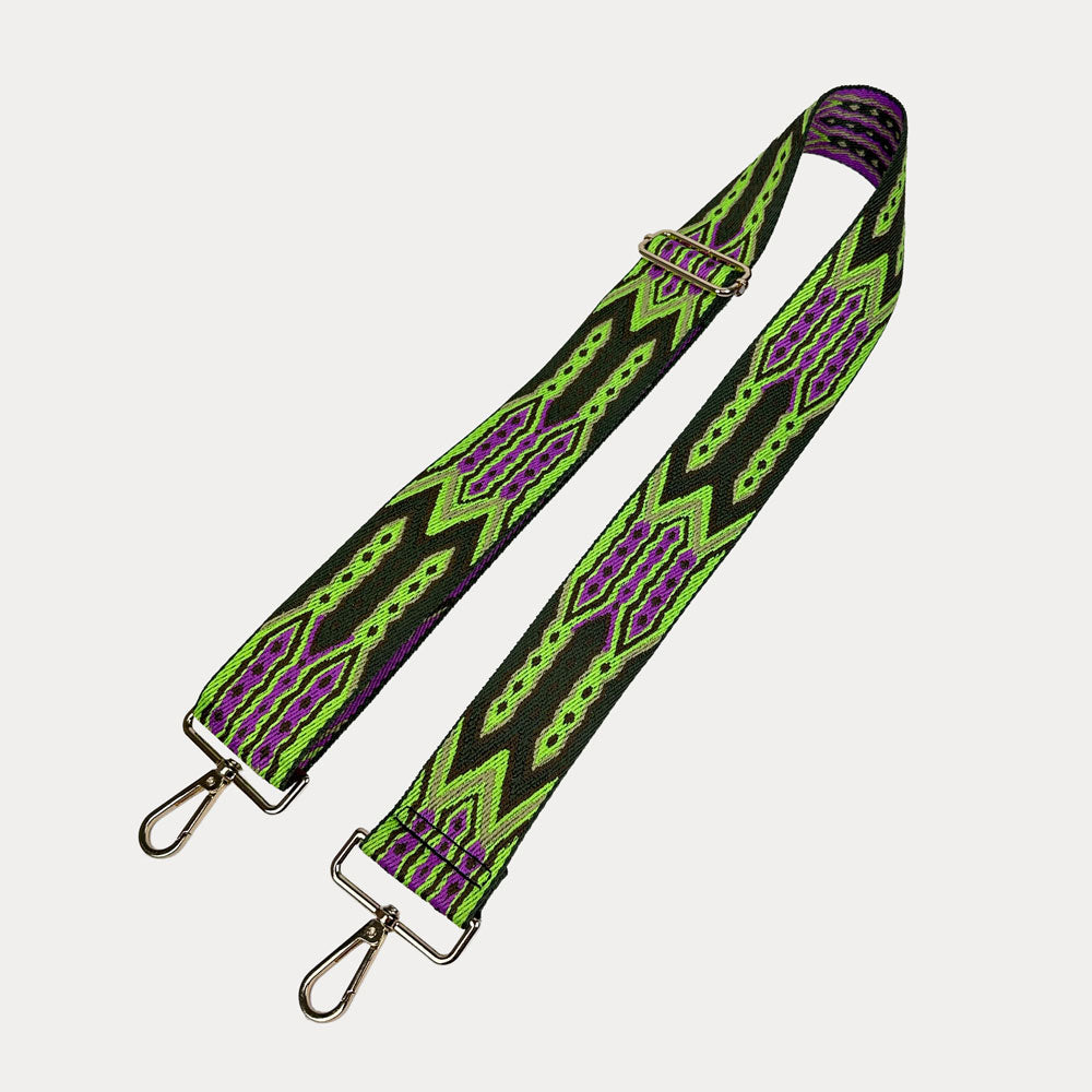 Lime, Army Pink patterned bag strap with gold hardware on a light grey background. Green and purple patterned strap on a white background