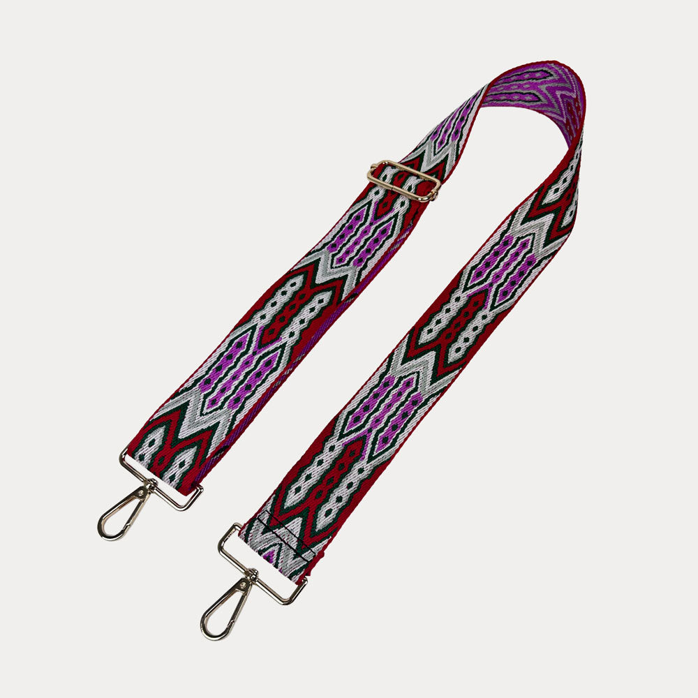 Red, Grey, Pink patterned strap with gold hardware on a light grey background