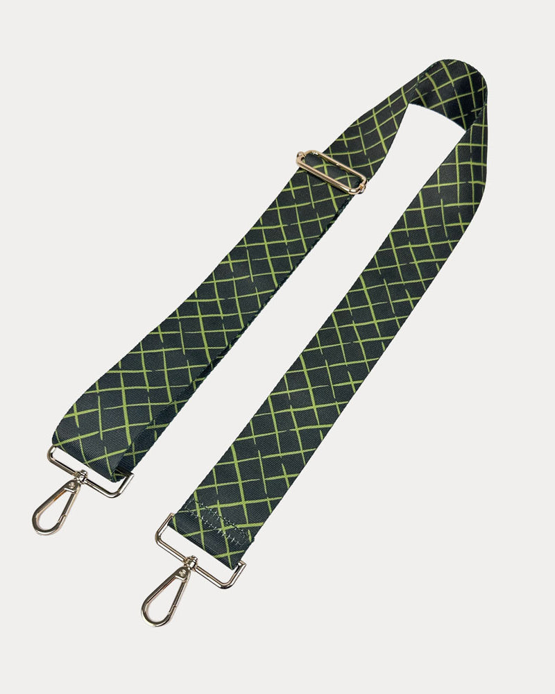 Army green and lime patterned strap with gold hardware on a white background