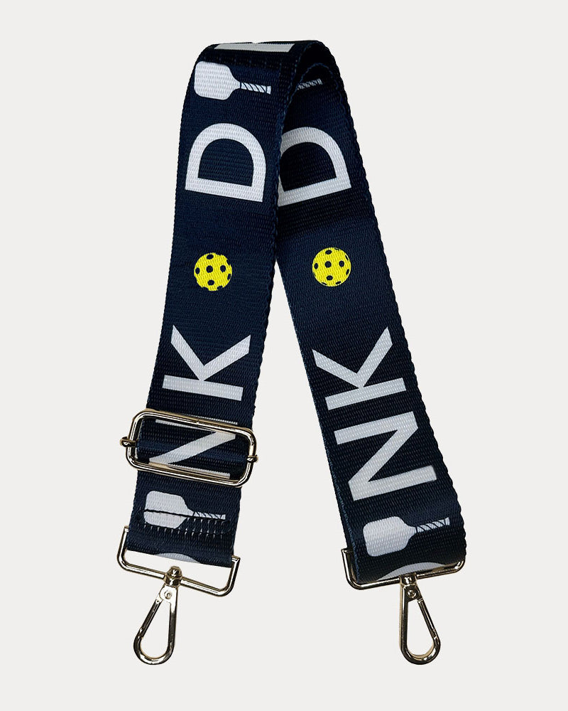 Navy ground with Dink text with gold hardware bag strap