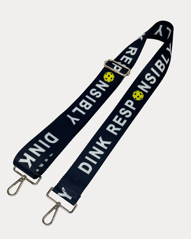 Black ground with Dink Responsibly text with gold hardware bag strap