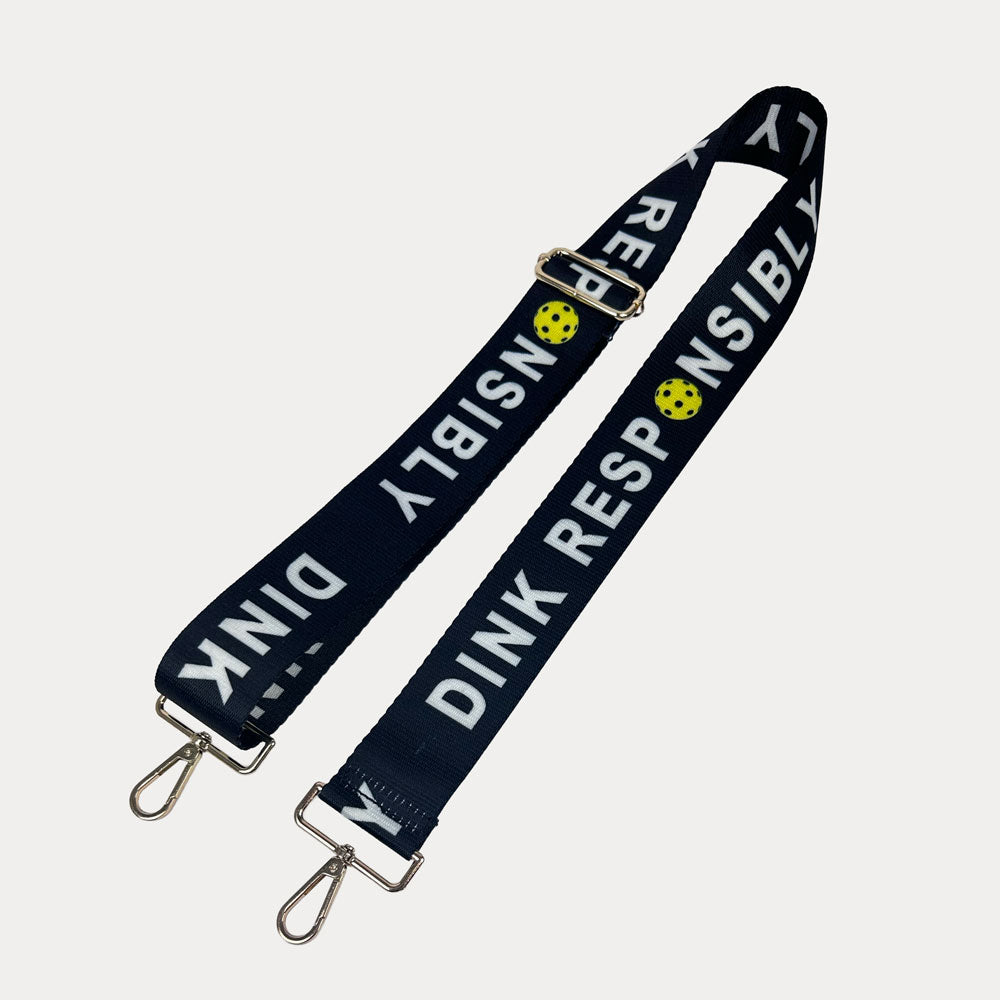Black ground with Dink Responsibly text with gold hardware bag strap