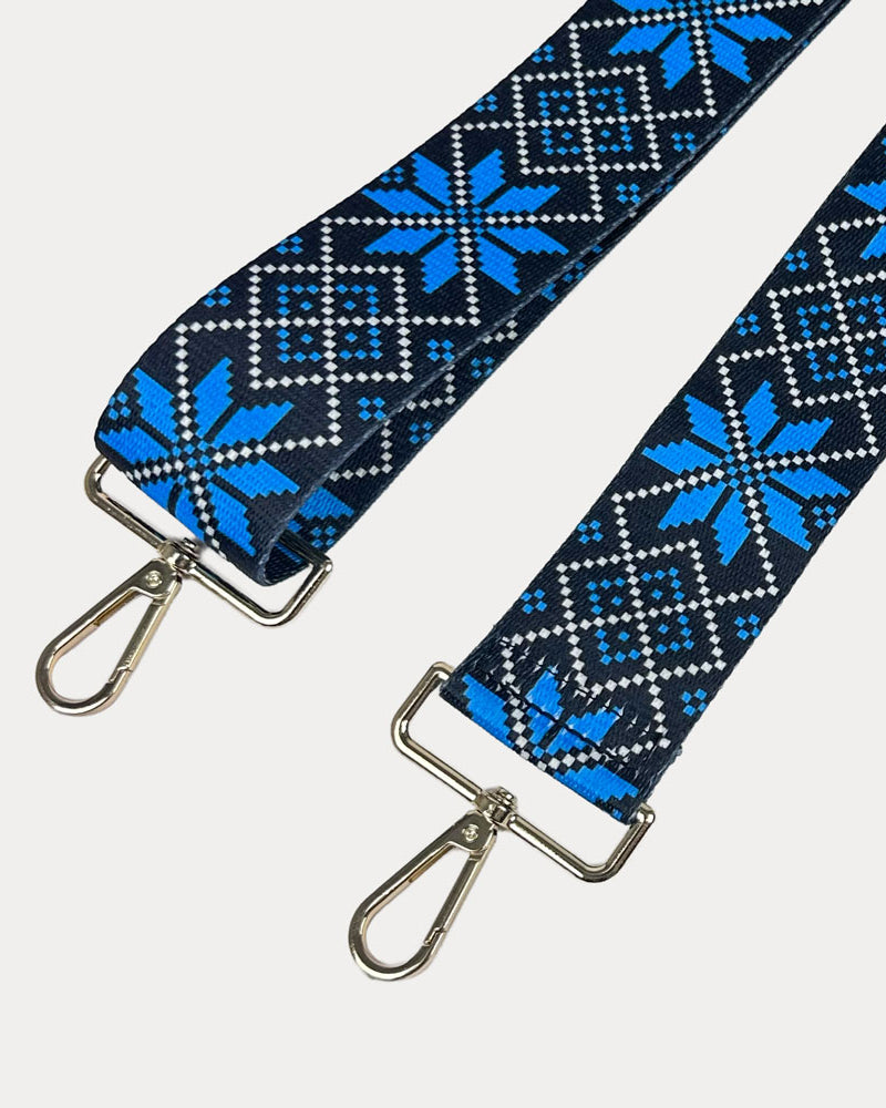 Blue snowflake printed bag strap with gold hardware