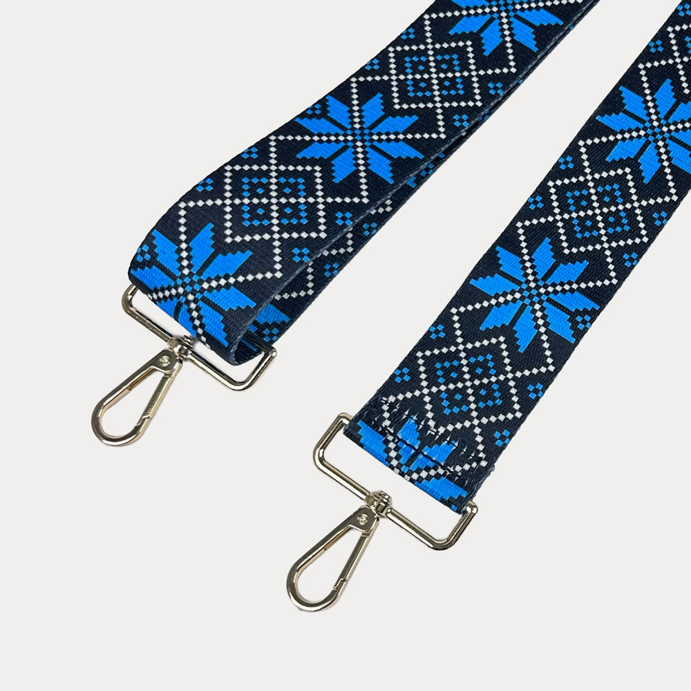 Blue snowflake printed bag strap with gold hardware