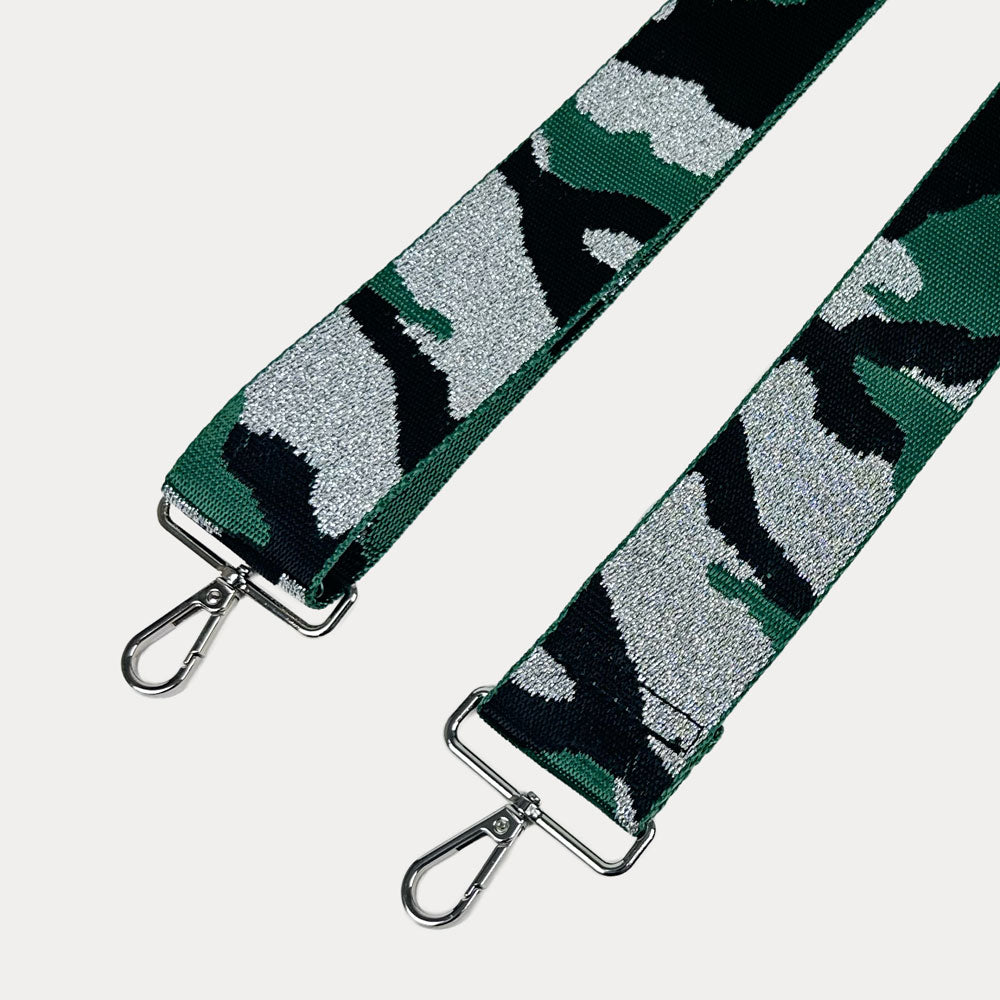 Green, Black, Silver camouflage patterned strap with silver metal clasps on a light gray background