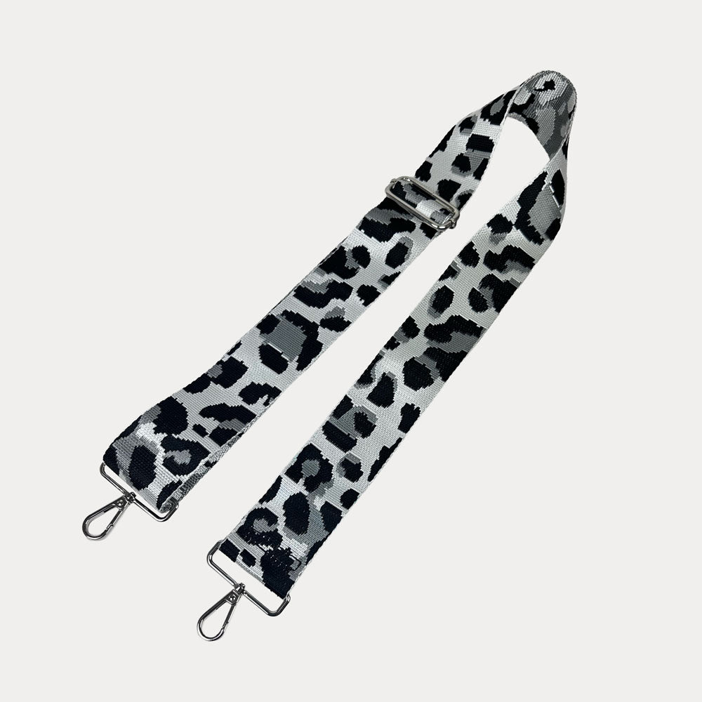 Grey Leopard print bag strap on a light gray background