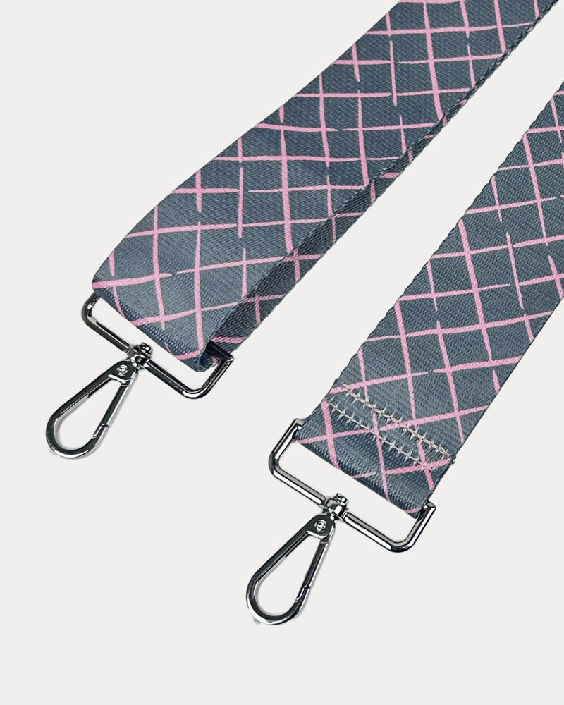 Grey and pink patterned strap with silver hardware on a white background