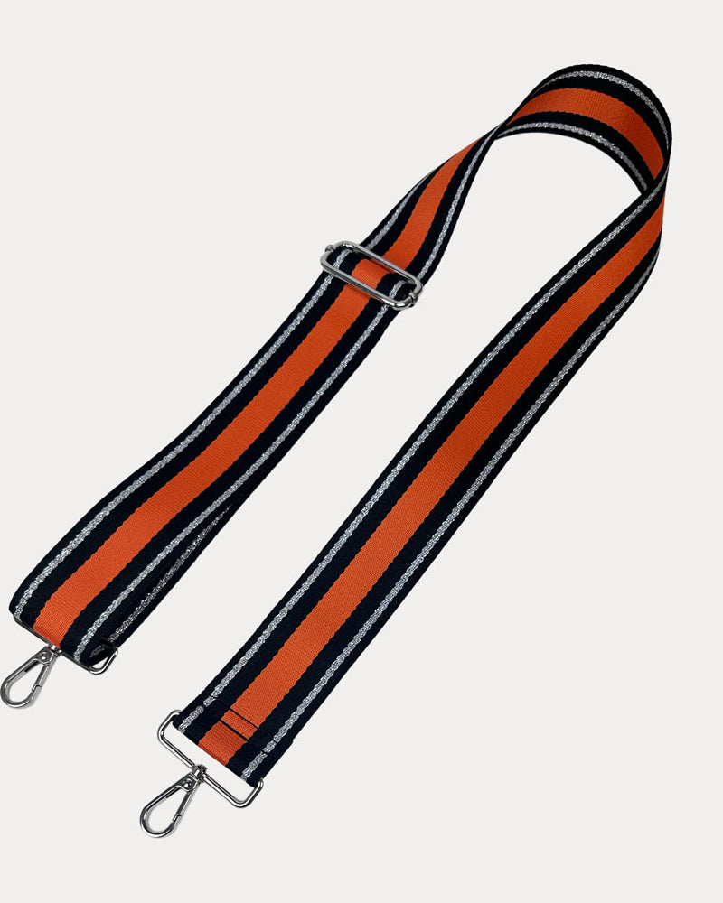 Orange, Navy, and Silver Metallic Striped bag strap with silver hardware on a light gray background