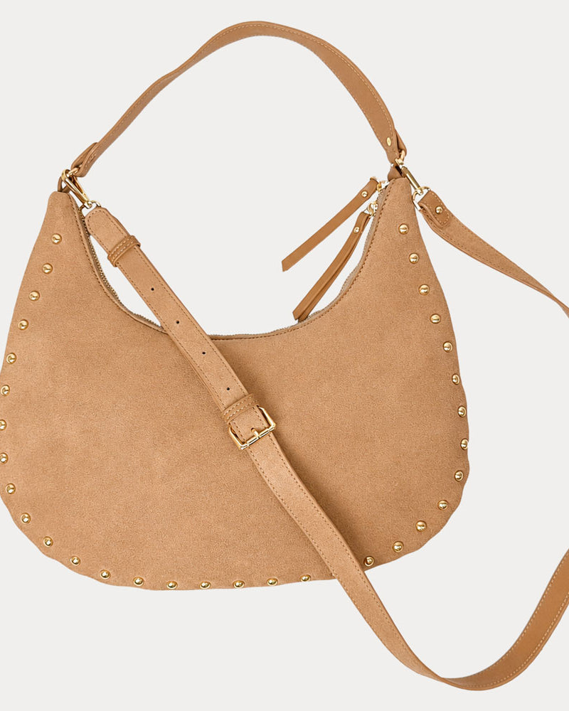 Ginger vegan suede handbag with studs on a light gray background
