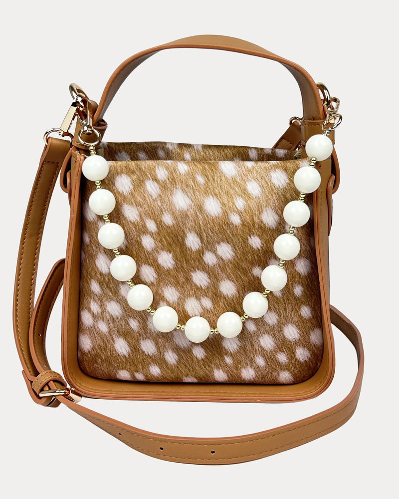 Handbag with Deer Print and Camel Vegan Leather Details with Cream Bead Trim and a Camel Vegan Leather Bag strap.