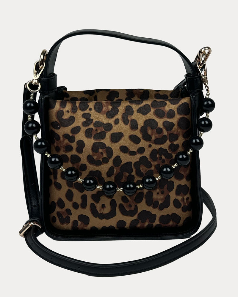 Handbag with Leopard Print and Black Vegan Leather Details with Black Bead Trim and a Black Vegan Leather Bag strap.