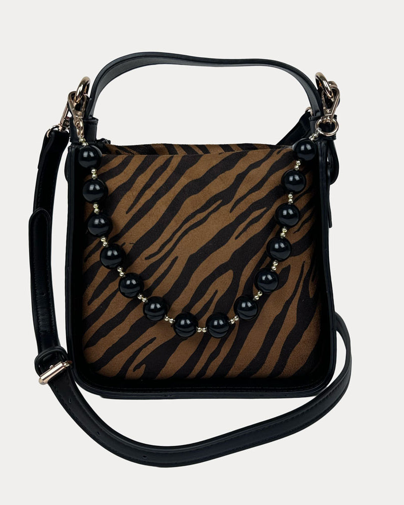 Handbag with Zebra Print and Black Vegan Leather Details with Black Bead Trim and a Black Vegan Leather Bag strap.