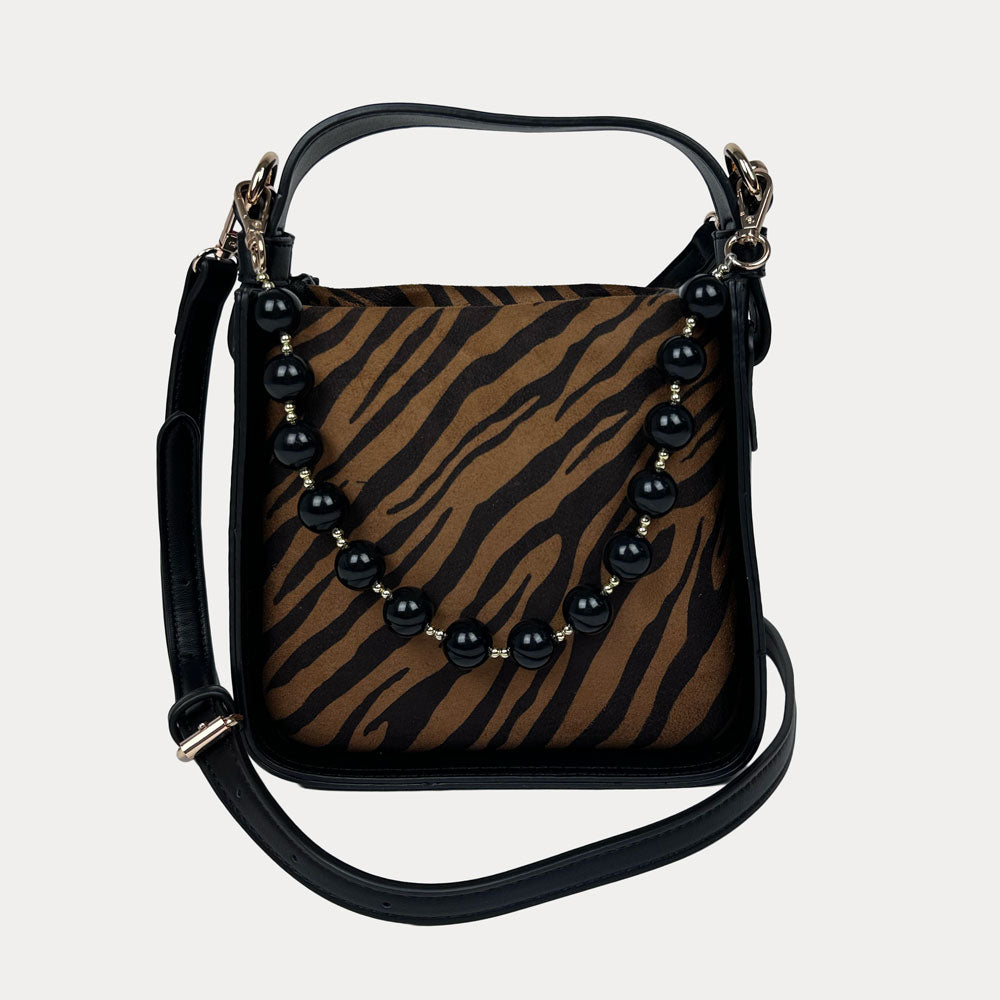 Handbag with Zebra Print and Black Vegan Leather Details with Black Bead Trim and a Black Vegan Leather Bag strap.