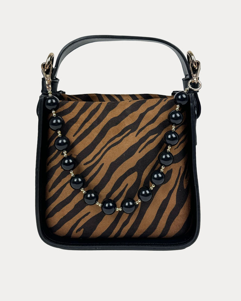 Handbag with Zebra Print and Black Vegan Leather Details with Black Bead Trim. Front View