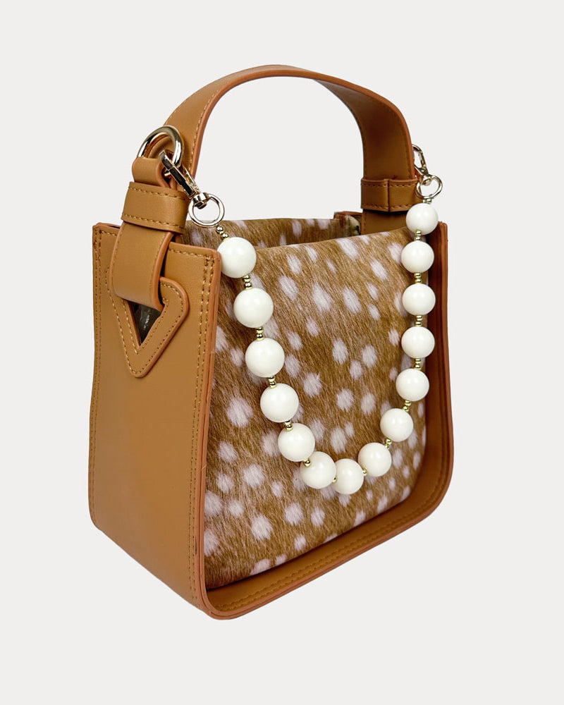 Handbag with Deer Print and Camel Vegan Leather Details with Cream Bead Trim. Side View