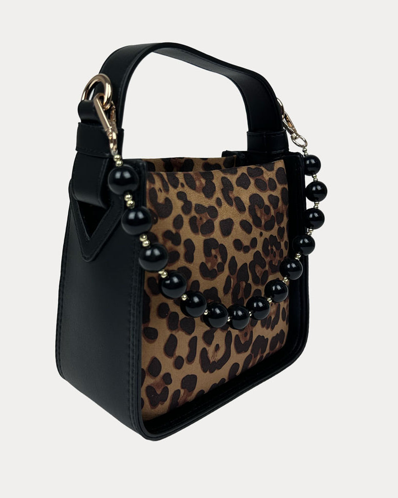 Handbag with Leopard Print and Black Vegan Leather Details with Black Bead Trim. Side View