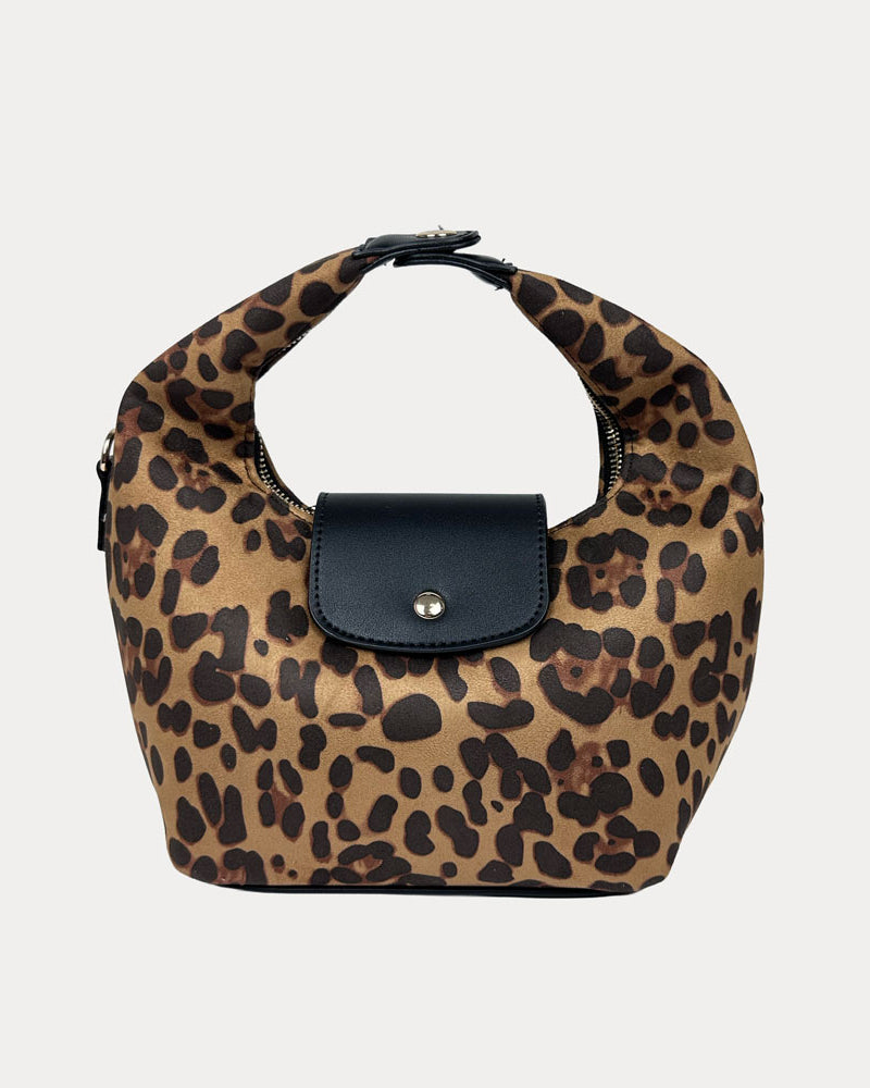 Handbag with leopard print and black leather accents on a light gray background- Front View