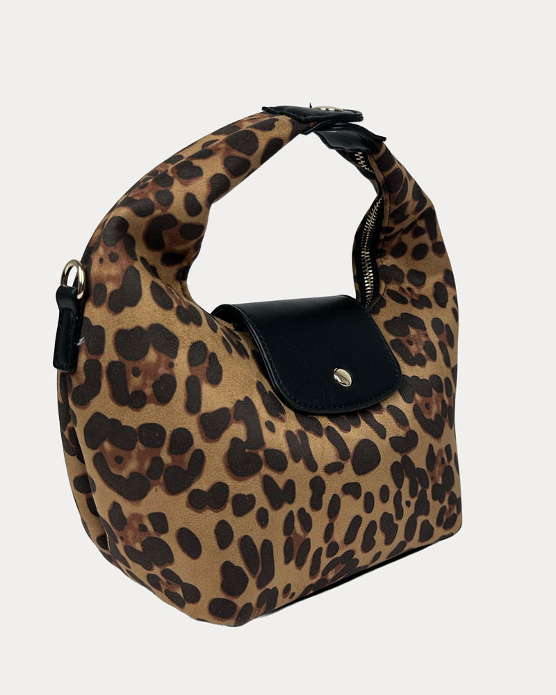 Handbag with leopard print and black leather accents on a light gray background- Side View