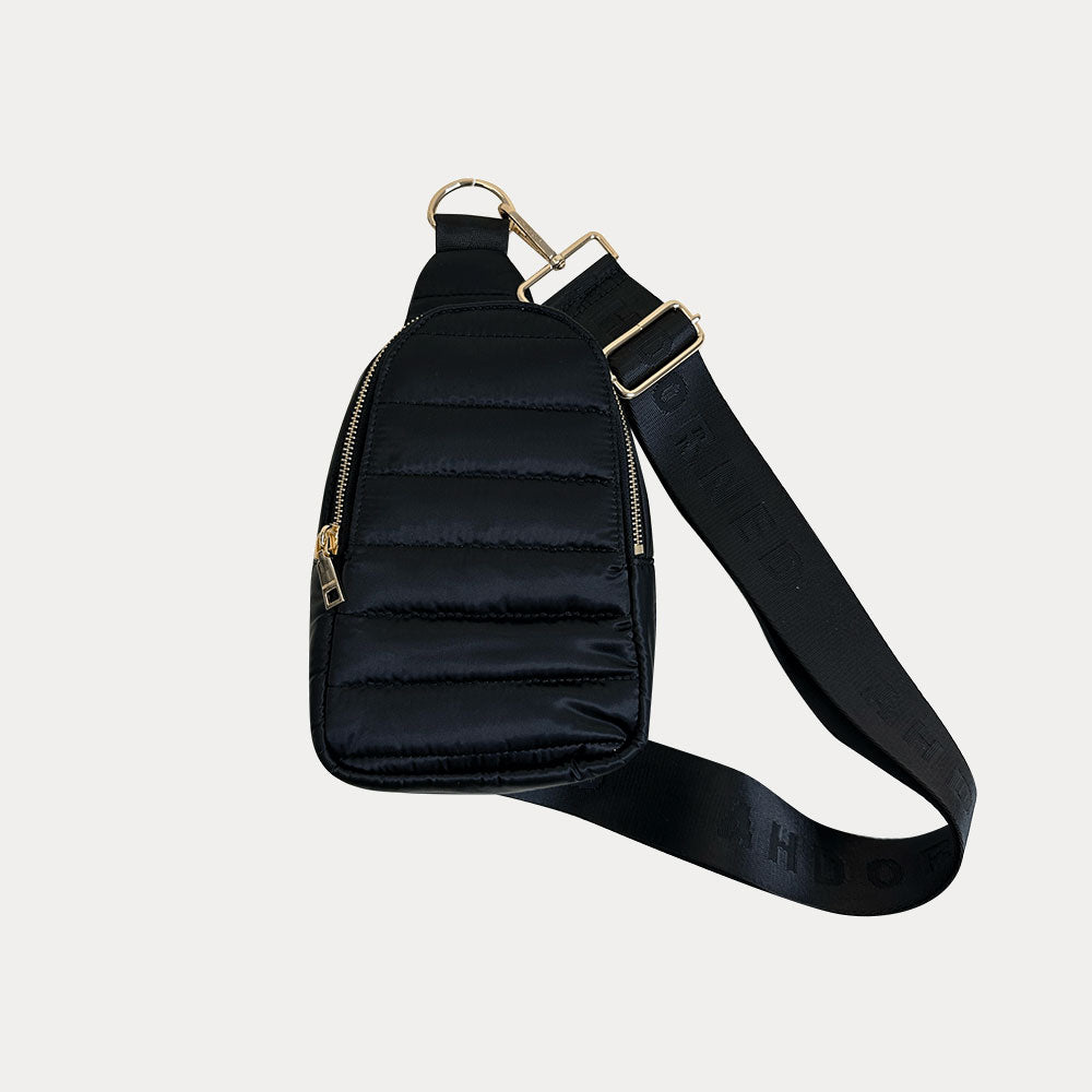 Eliza Quilted Nylon Sling in Black, shown with bag strap
