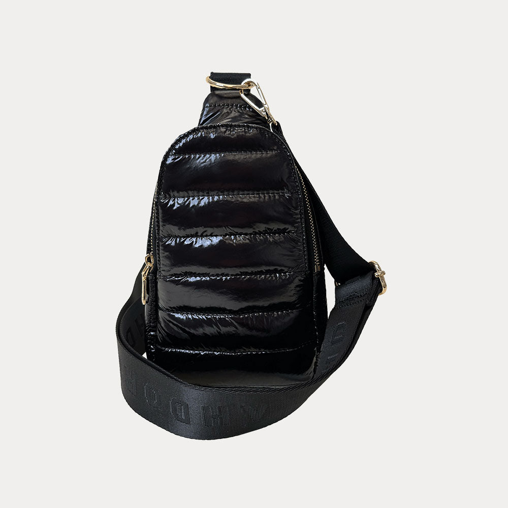 Eliza Quilted Nylon Sling in Liquid Black, shown with bag strap