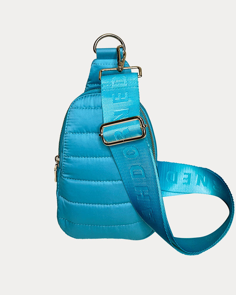 Eliza Quilted Nylon Sling in Turquoise shown with bag strap
