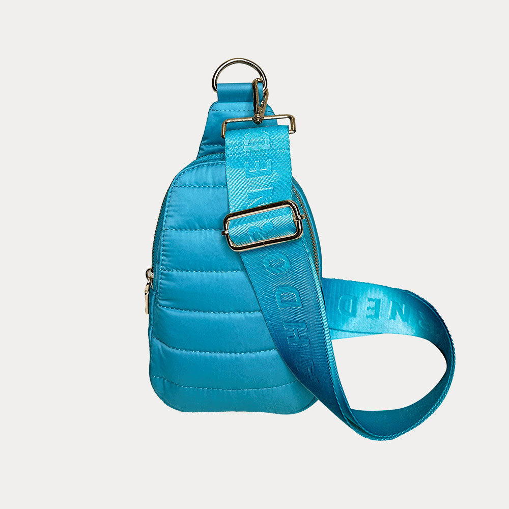Eliza Quilted Nylon Sling in Turquoise shown with bag strap