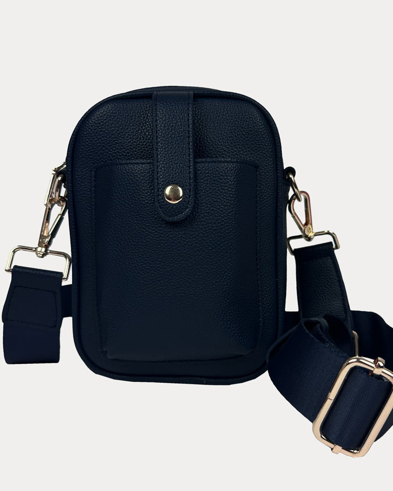 Maya Crossbody in Black Vegan Pebble Leather with a crossbody bag strap and gold trim.