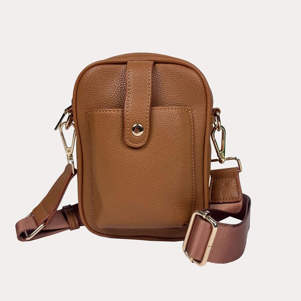 Maya Crossbody in Camel Vegan Pebble Leather with a crossbody bag strap and gold trim.