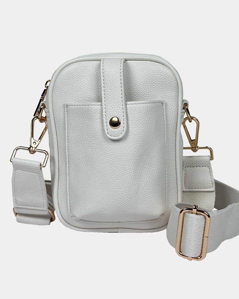 Maya Crossbody in Cream Vegan Pebble Leather with a crossbody bag strap and gold trim.