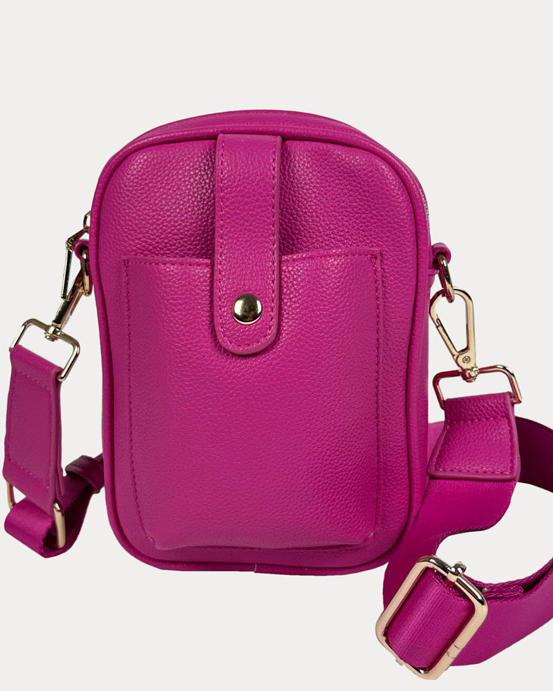Maya Crossbody in Raspberry Vegan Pebble Leather with a crossbody bag strap and gold trim.