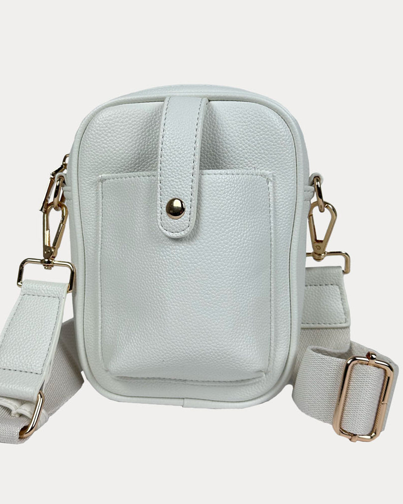 Maya Crossbody in White Vegan Pebble Leather with a crossbody bag strap and gold trim.