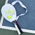 Piper Quilted Nylon Tennis Racket Back in White on the tennis court