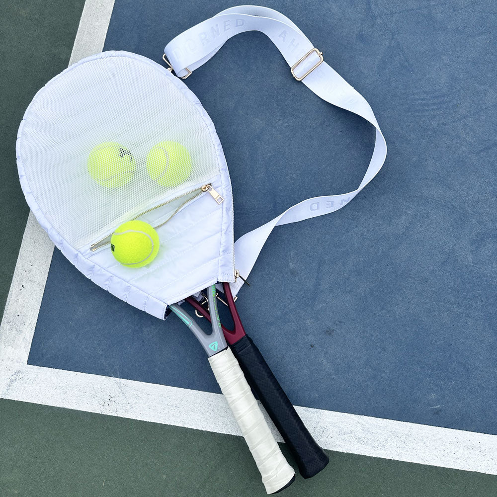 Piper Quilted Nylon Tennis Racket Back in White on the tennis court
