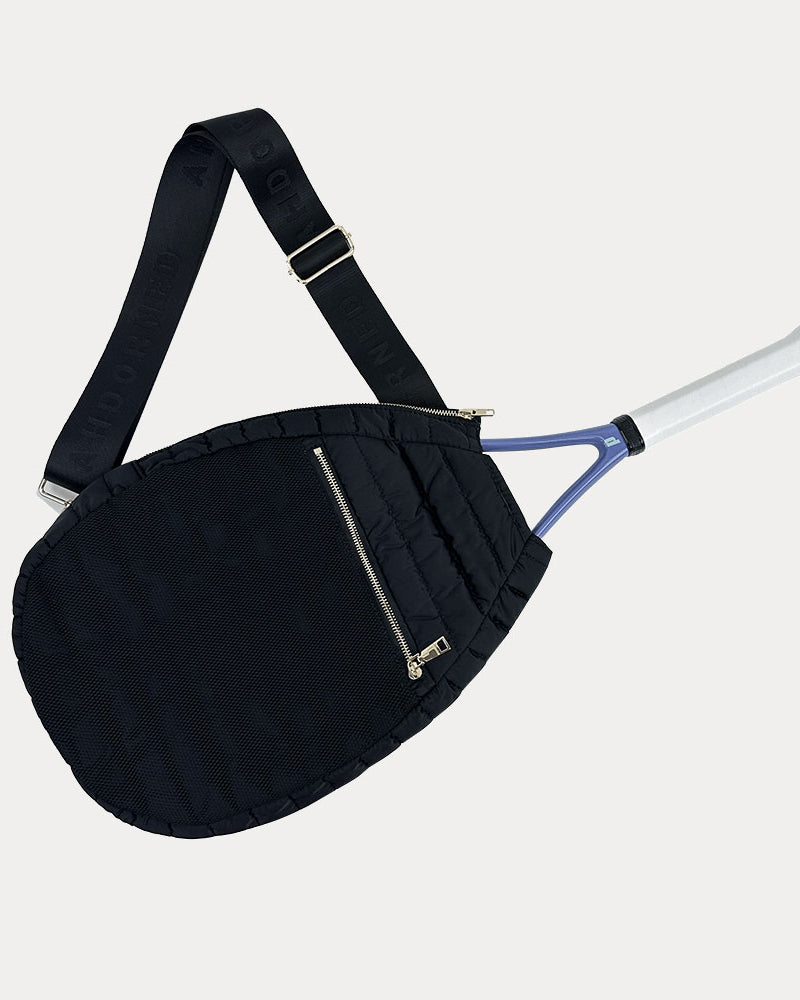 Piper Quilted Nylon Tennis Racket Bag in Black, shown with matching adjustable strap