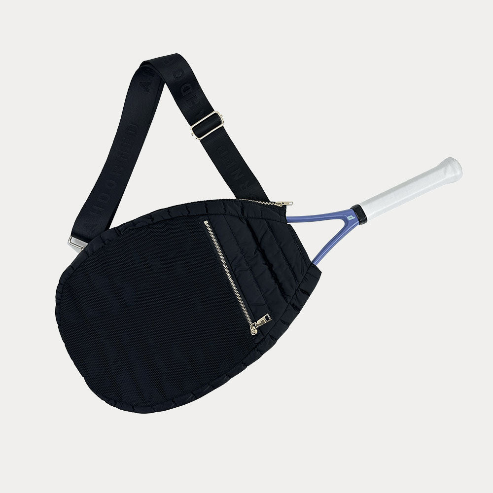 Piper Quilted Nylon Tennis Racket Bag in Black, shown with matching adjustable strap