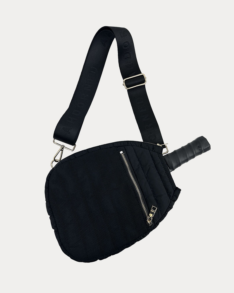Poppy Quilted Nylon Pickleball Paddle Bag in Black, shown with matching adjustable strap