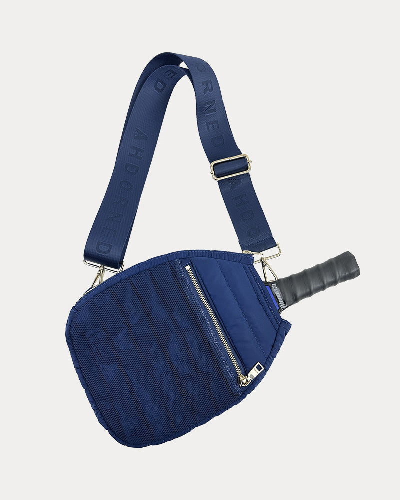 Poppy Quilted Nylon Pickleball Paddle Bag in Navy, shown with matching adjustable strap