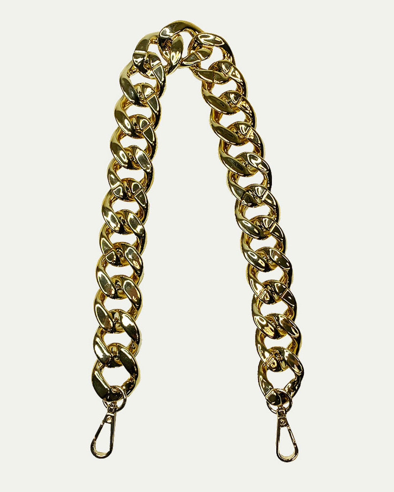 A gold-colored resin chain shoulder strap with clasp rings.