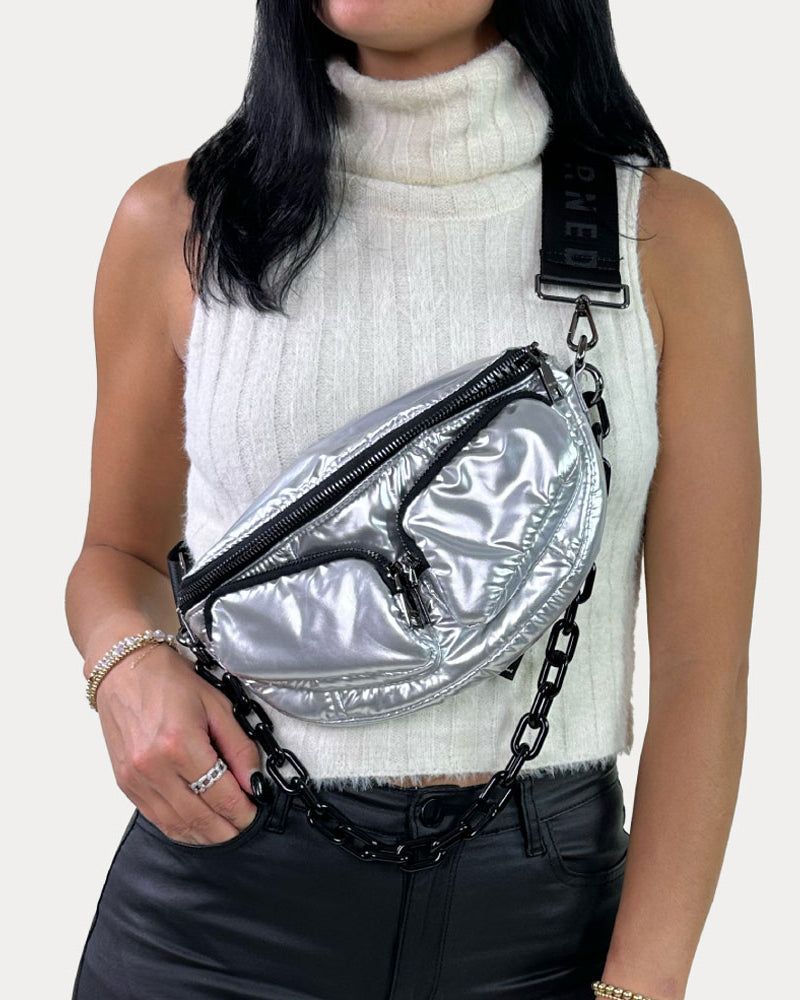 woman wearing the Rachel Nylon Sling bag in Silver as a crossbody bag