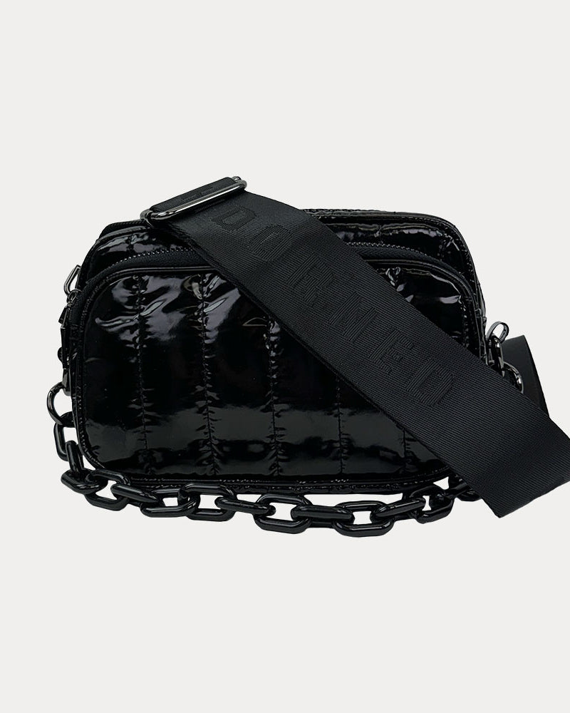 Ramona Quilted Nylon Crossbody in Black, shown with resin chain and black adjustable strap