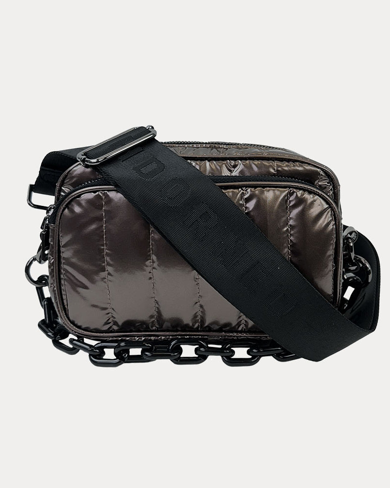 Ramona Quilted Nylon Crossbody in Bronze, shown with resin chain and black adjustable strap