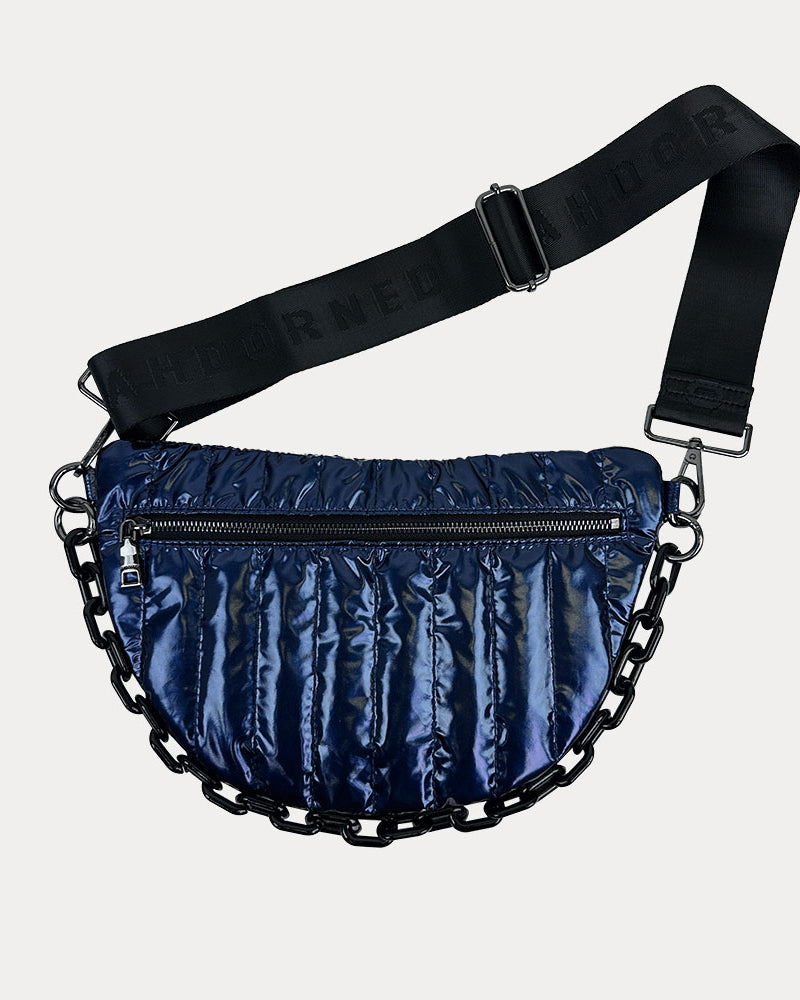 Reese Quilted Nylon Sling in Navy, shown with resin chain and black adjustable strap