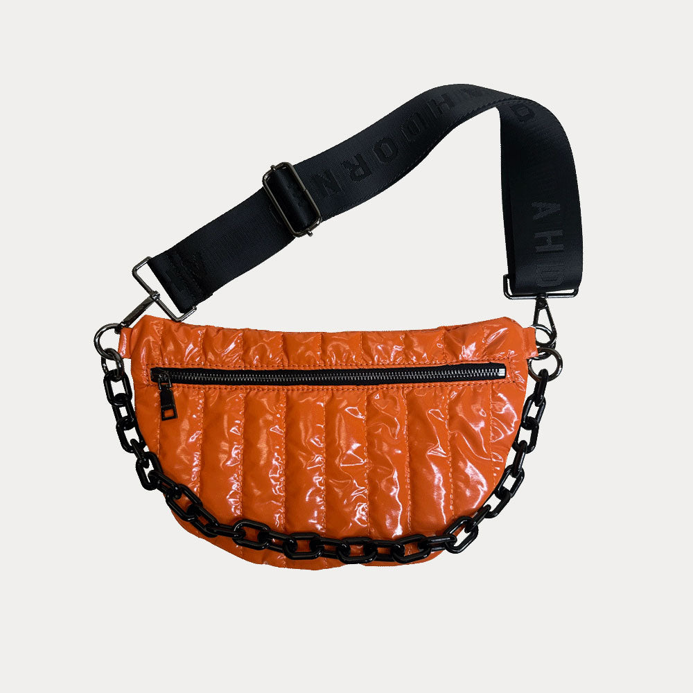 Reese Quilted Nylon Sling in Orange, shown with resin chain and black adjustable strap