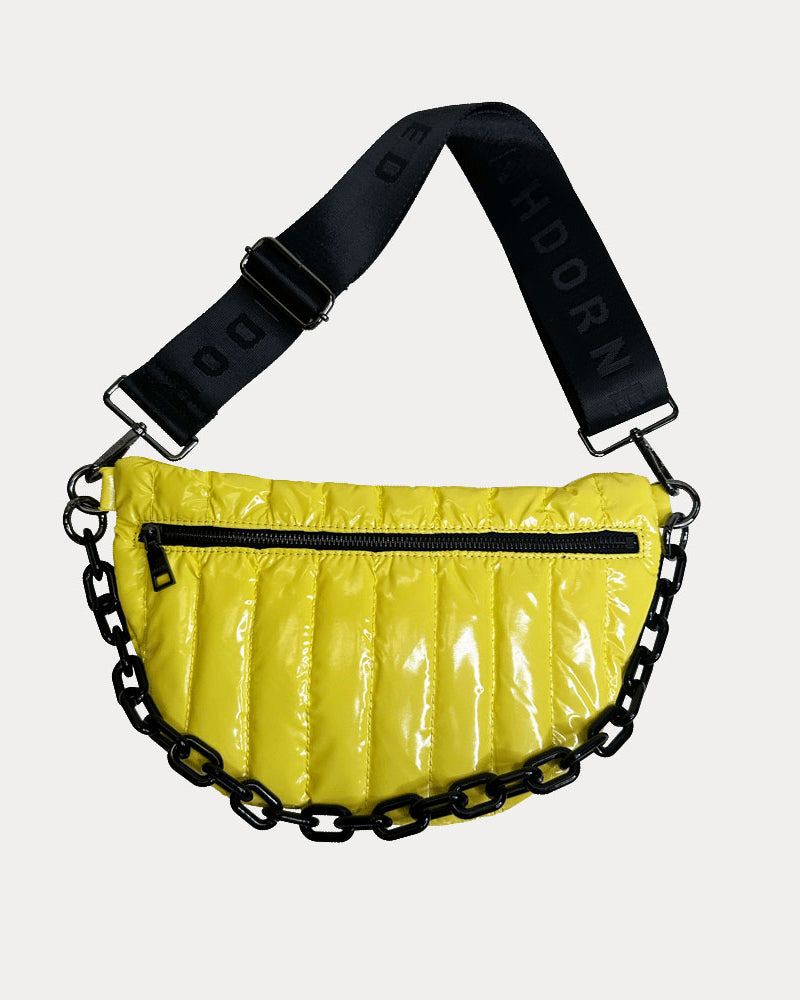Reese Quilted Nylon Sling in Yellow, shown with resin chain and black adjustable strap