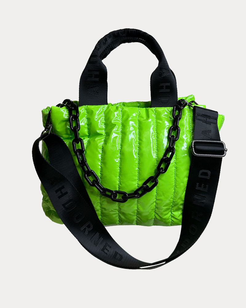 Rosie Quilted Nylon Tote in Green, shown with resin chain and black adjustable strap