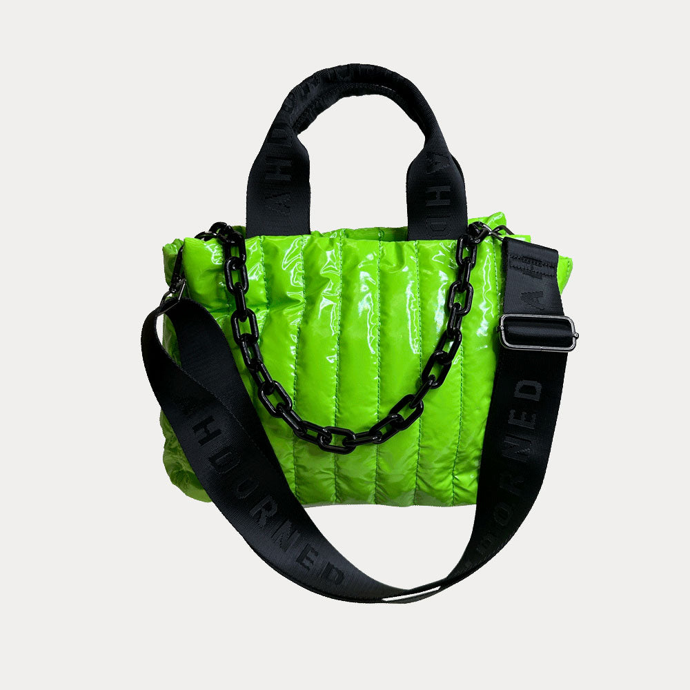 Rosie Quilted Nylon Tote in Green, shown with resin chain and black adjustable strap